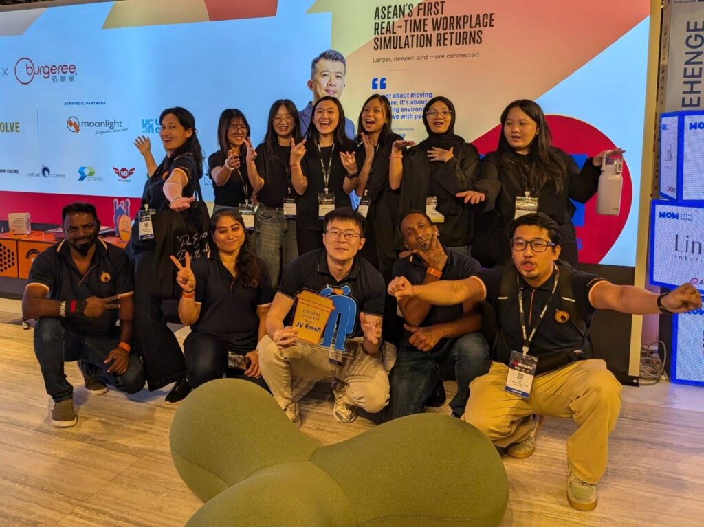 The Like Me Coffee team posing together at the ASEAN Real-Time Workplace Simulation event.